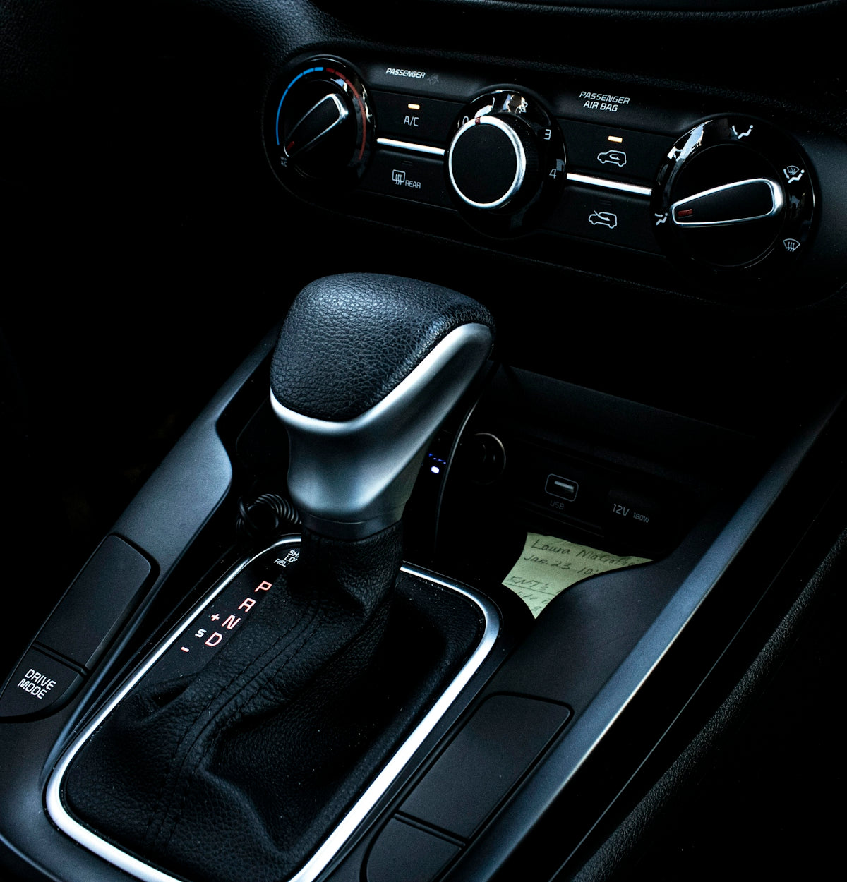 a close up of a steering wheel in a car